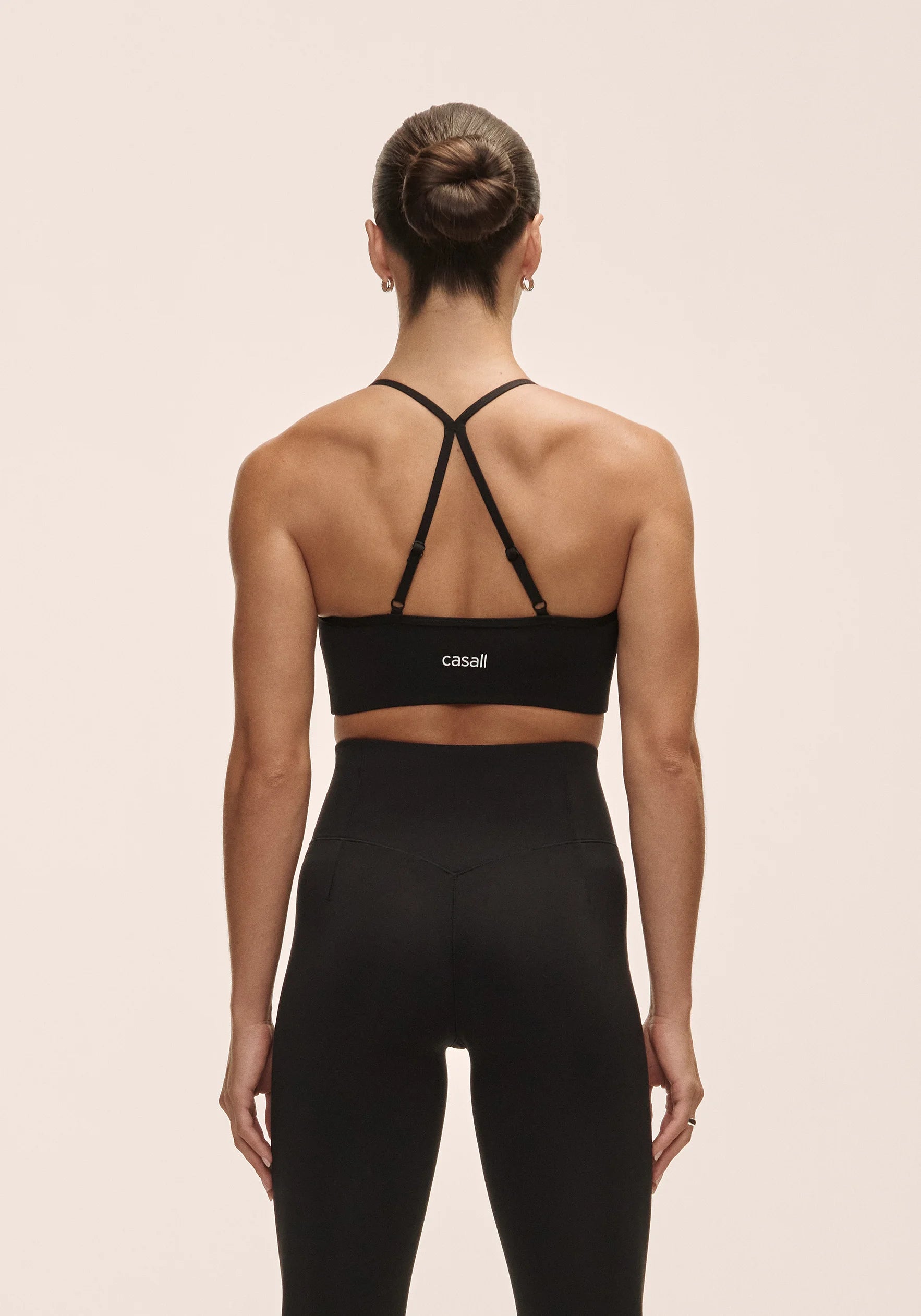 Casall Sleek Strappy Sports Bra reggiseno nero sostegno medio