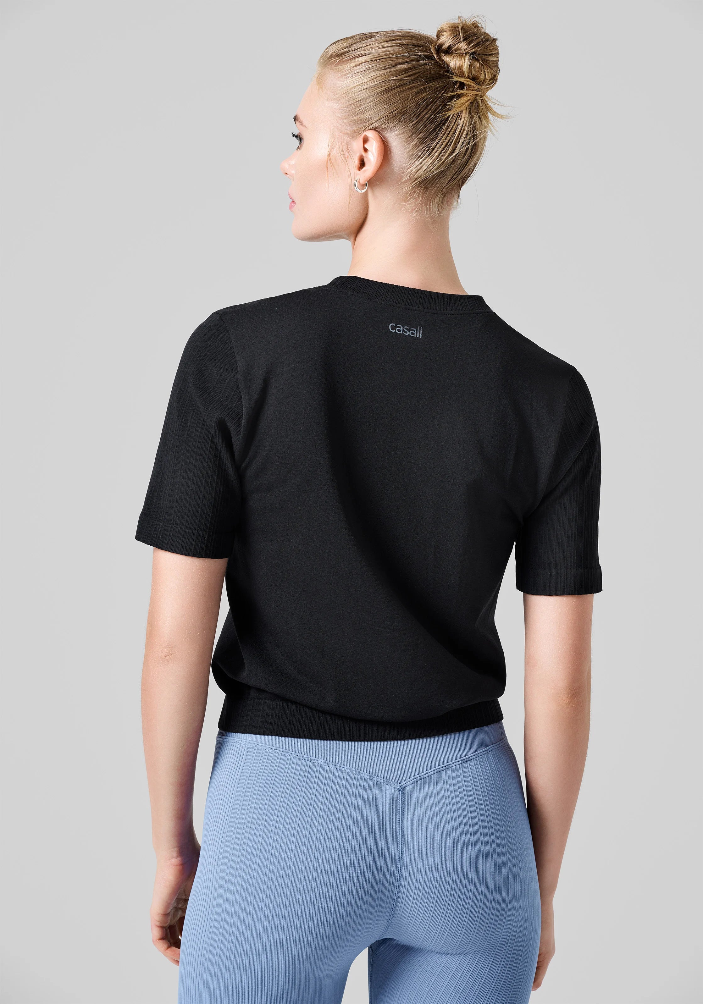 Casall Seamless Rib Sleeve Tee t-shirt Nera poliammide riciclata