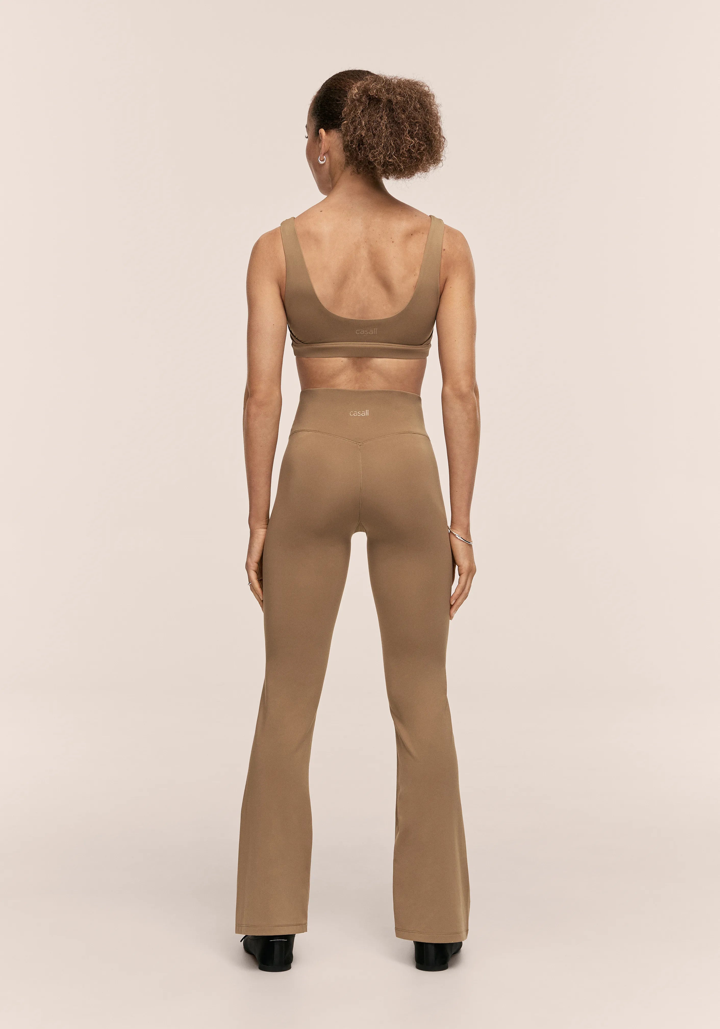 Casall Soft Touch pantaloni flare beige chiaro morbidi