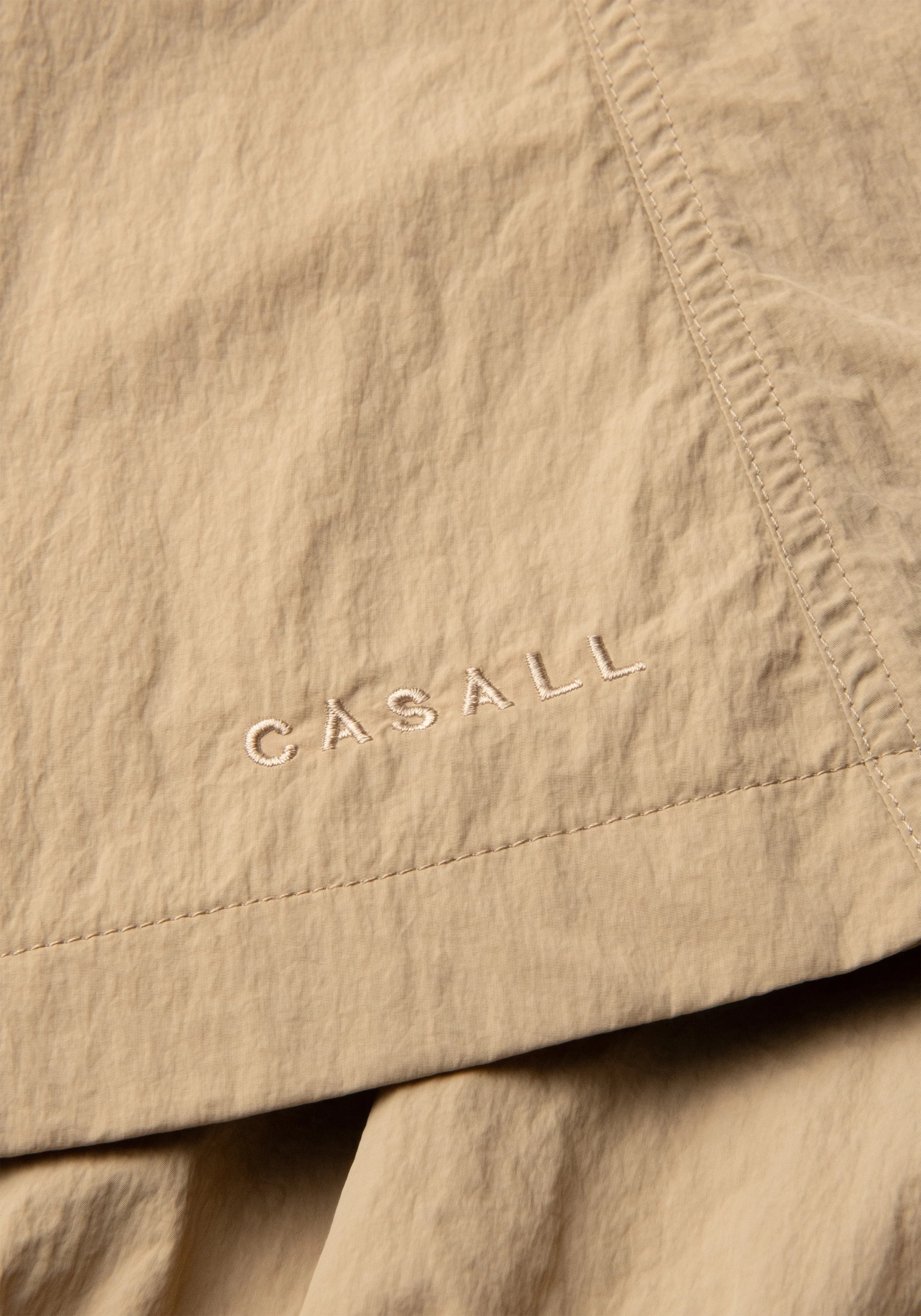 Casall Sling Active Woven Skirt gonna sabbia scuro riciclata