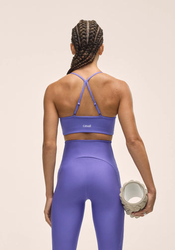 Casall Sleek Strappy reggiseno sportivo viola supporto medio