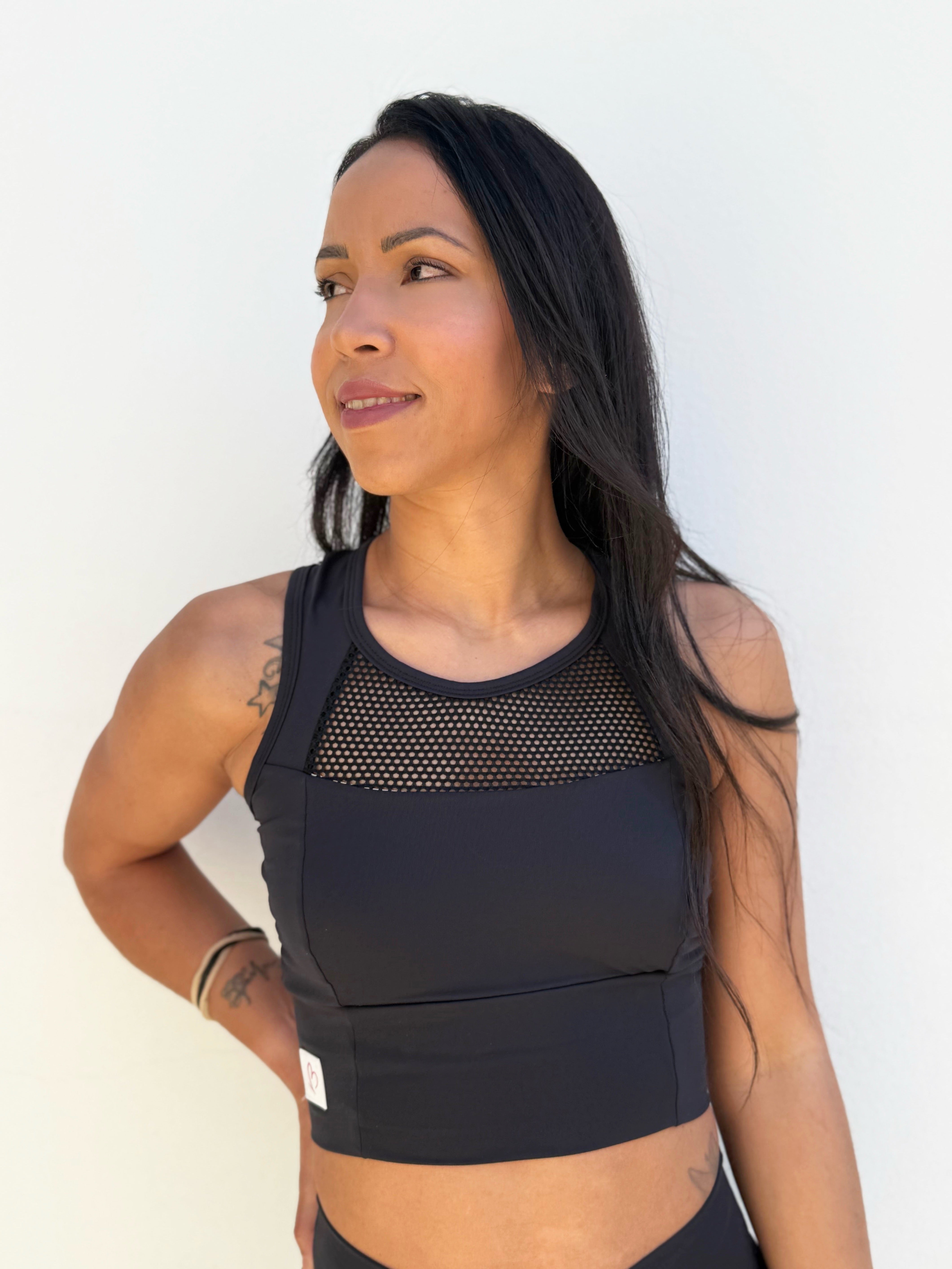 VB Aura top sportivo crop con rete
