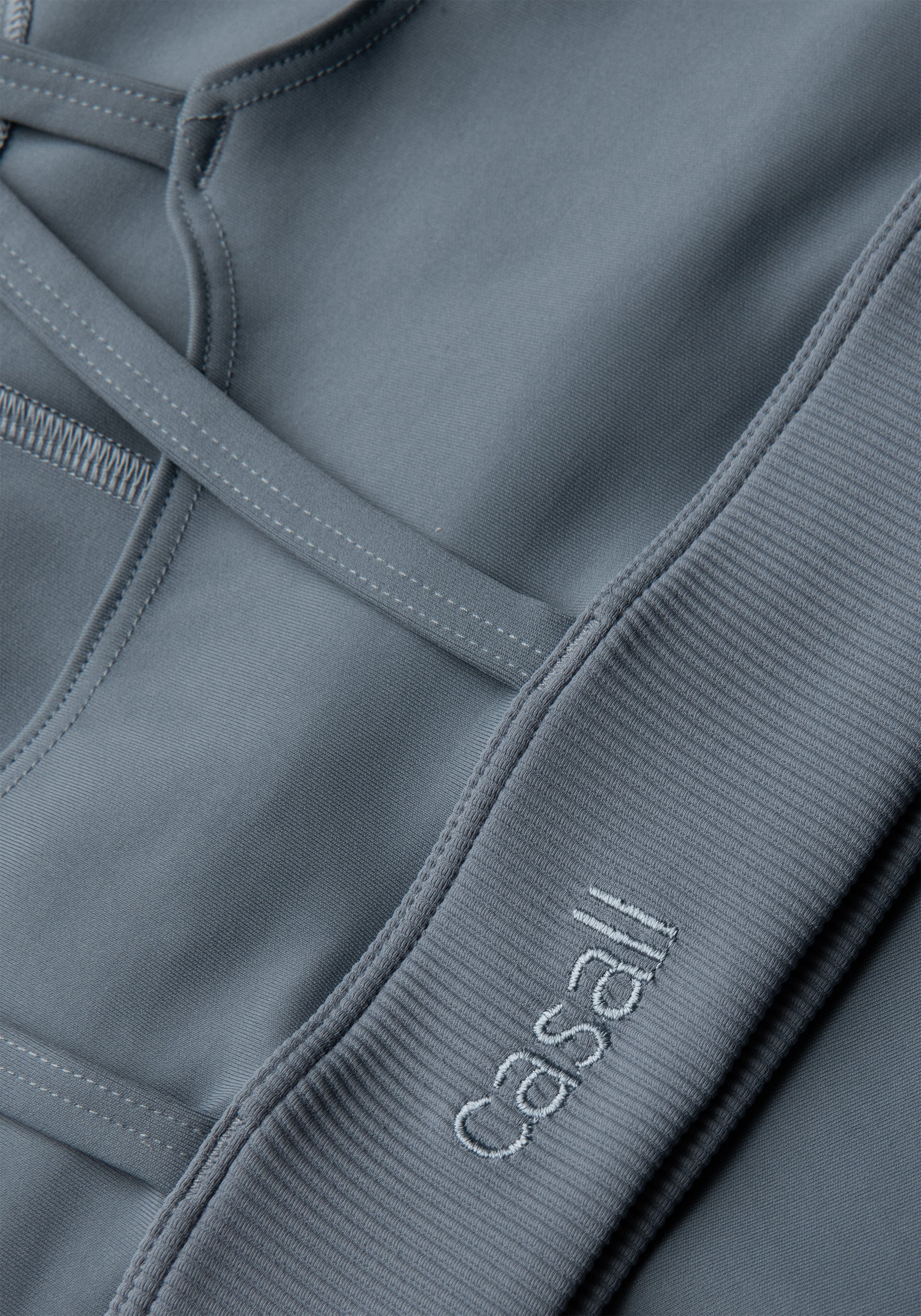 Casall Brace top sportivo blu costine traspirante