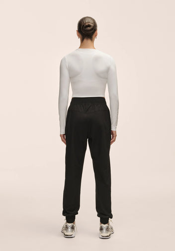 Casall Everywhere Woven Pant pantaloni neri vita alta