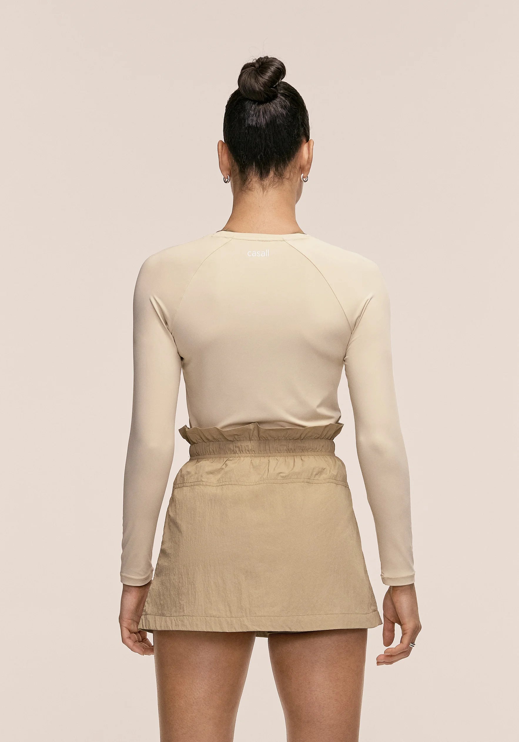Casall Sling Active Woven Skirt gonna sabbia scuro riciclata