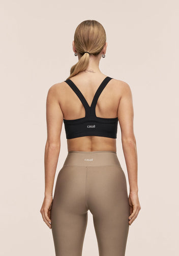 Casall Defined Rib Sport Top sportivo nero costine